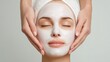 © Newleks - Woman enjoying a purifying facial mask during a spa beauty treatment, receiving a relaxing application from a beautician for skin care and wellness