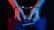 © Zee - Arrested criminal hands with handcuffs holding passport