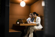 © BusinessClass by W61 - Business coworkers discussing project at modern office workspace