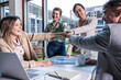 © BusinessClass by W61 - Business team celebrating success with high five in modern office
