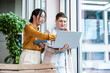 © BusinessClass by W61 - Teamwork and collaboration in a modern office with digital devices