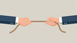 © Ophelia - Business competition concept with two hands pulling a rope on neutral background