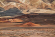 © marcodenaro - Telephoto shot of multicolored volcanic hills in the High Andes. Excellent texture, natural earth tones, and soft lighting create a painterly, layered mountain landscape.