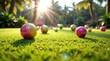 © Alex Pios - Close-up of colorfully designed lawn bowls on a green outdoor bowling green in bright sunlight