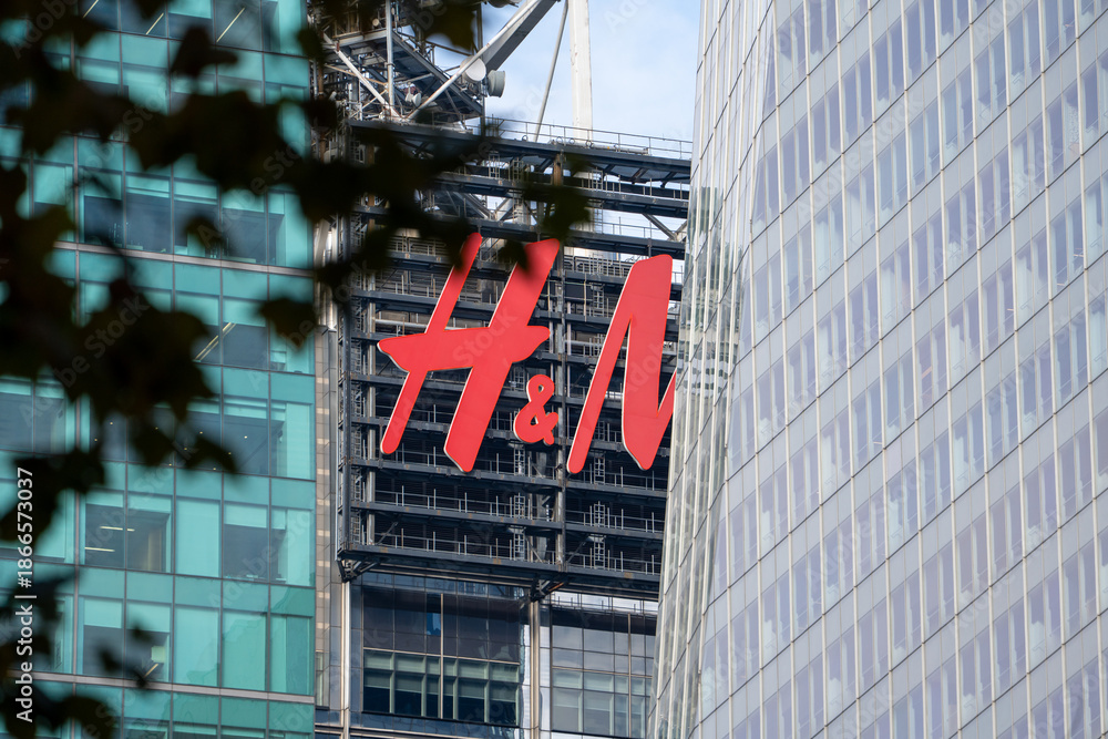 New York, USA - November 23, 2025: An oversized H&M logo dominates a ...