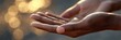 © Ingvar Shelly - a close-up side shot of two hands almost touching, against a warm, neutral bokeh background emotionally intense, with ample copy space