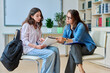 © Valerii Honcharuk - Female teacher, counselor working with school student teenage girl