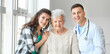 © Pixel-Shot - Senior woman with her granddaughter and doctor in hospital