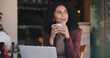 © Flash25/peopleimages.com - Drink, laptop and thinking with woman in cafe for hospitality blog, food review and reflection. Remote worker, online vision and restaurant critic with person in coffee shop for idea and web log