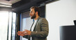 © Flash25/peopleimages.com - Presentation, meeting and businessman in office for planning with finance pitch for training. Seminar, professional and male financial manager with conference for investment proposal in workplace.