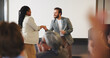 © Flash25/peopleimages.com - Handshake, audience and speaker with award for presentation, business conference or event. Workshop, shaking hands and prize announcement with coach, achievement and trophy for career development
