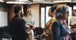 © Flash25/peopleimages.com - Happy, business people and networking at convention with discussion for workshop, expo and career growth. Seminar, group and talking for professional connection, collaboration and tradeshow feedback.