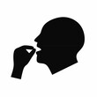 © Agussetiawan99 - Pill icon. A head with an open mouth and a hand holding a pill. Isolated on a white background. Vector silhouette.