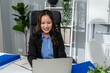 © Kawee - Asian beautiful businesswoman call center working in office corporate.