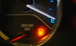 © NARONG - Low Fuel Warning Light on car Dashboard Display