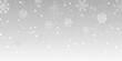 © Asit - A gentle snowfall with delicate white snowflakes against a soft gray background