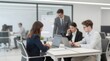 © Studicon - Blurry group of office workers collaborates on a project in a modern office space