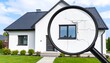© Super Abi - Magnifying glass reveals cracks in the stucco facade of a modern house, highlighting potential structural issues or damage needing repair and inspection by a professional