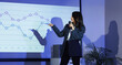 © Pixel-Shot - Female Asian business speaker conducting seminar in office