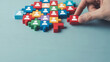 © PureStock - Human resource wood table puzzle block wooden background concept group people management business career colorful jigsaw planning assessment arrangement connection team recruitment strategy