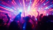 © balsem - Blurred crowd dancing at night club with dynamic light effects