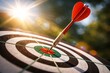 © Vladyslav Tykhonov - Red dart hitting the bullseye on a target board outdoors with bright sunlight and lens flare, symbolizing accuracy, focus, success, and goal achievement