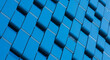 © PhotoArtHub - Geometric pattern of blue block facade, creating a modern, abstract texture, representing contemporary architecture, innovation, and futuristic design