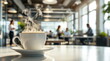 © volff - Cup of coffee with rising steam in the foreground of a large modern office with employees working. Conceptualizing morning mood and productivity and a professional business lifestyle.