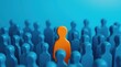 © Alex Pios - individuality, uniqueness, standing out, crowd, blue background, focus, concept of individuality, leadership A bright orange figure stands out among a sea of blue figures