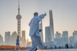 © Jin - Shanghai's Bund and Lujiazui in the morning light, along with citizens exercising in the morning.
