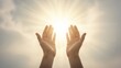 © Katsyarina - Woman hands reaching up to bright sun rays. Hope concept for spirituality, religion, and freedom. Open palms worshiping, praying, or blessing symbol