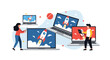 © Ariyan - Team of young professionals using laptops displaying a rocket launch to symbolize startup growth, business success, and fast technology.