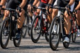 Cyclists Racing In Motion On Urban Road.
Close up view of cyclists legs and wheels during a road race, capturing speed, teamwork and athletic energy on asphalt in a dynamic competitive cycling scene.