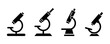 © AniaNoor - Set of four black silhouette microscope icons science
