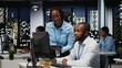 © DC Studio - Black company advisors doing teamwork at night to meet deadlines, completing monthly reports and KPI numbers for business productivity. Tasks in strategy room after hours.
