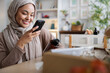 © Jovo Jovanovic/Stocksy - Influencer takes photo of newly received product