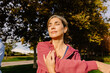 © Adrian Rodd/Stocksy - Middle-aged woman performing arm stretching exercises