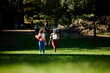 © Boris Jovanovic/Stocksy - Athlete women stroll in the park