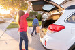 © Christine La/Stocksy - packing car trunk