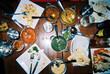 © Cara Dolan/Stocksy - Messy overhead view of plates after restaurant meal