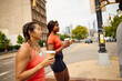 © Boris Jovanovic/Stocksy - Athletes with coffee to go