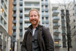© Artcore Studio/Stocksy - Smiling man portrait