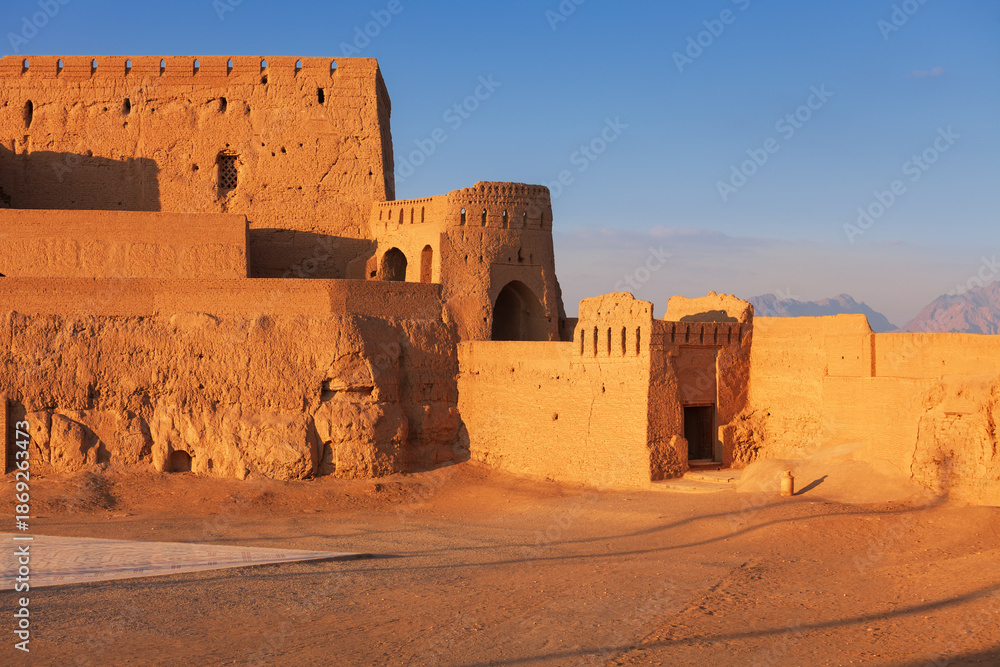 The image shows the Narin Castle in Meybod, Iran. The adobe castle with ...