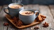© PixelCrafted - Cozy cups of chai tea with star anise and cinnamon sticks on a wooden tray.