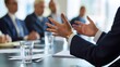 © TensorSpark - Business leader gesturing during boardroom meeting with executive, document, glass of water â€” illustrating executive coaching, leadership development and strategic guidance.