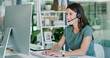 © peopleimages.com - Contact us, typing and woman with computer in call center for help desk, language translation or crm. Headset, happy agent and person with feedback, multilingual support or customer service in office