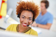 © peopleimages.com - Call center agent, portrait and business woman with customer service, help desk and support. Smile, tech or confident consultant with headset for communication, coworking or contact us for assistance