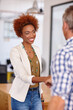 © peopleimages.com - Recruitment, happy or business woman with handshake in office, welcome or candidate hiring for company. Friendly, introduction or agent shaking hands with new employee, onboarding and congratulations
