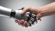 © Marlon - Human hand shaking robotic hand in partnership and innovation