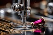 © YouraPechkin - Close-up of antique sewing machine sewing intricate design with vibrant thread
